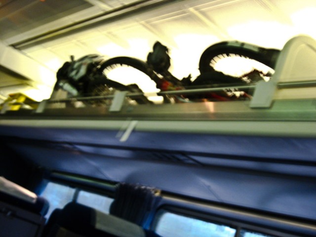 two folded bikes on train